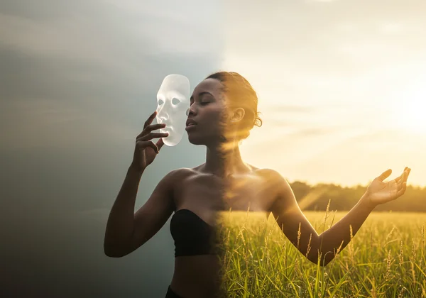 Person shedding a mask, embracing their authentic self